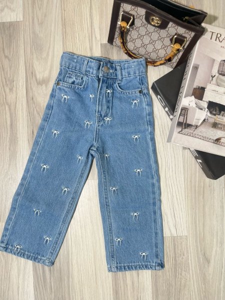 Jeans with embroidered bows